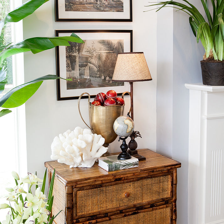 Natural Bamboo Drawers with trophy on top.