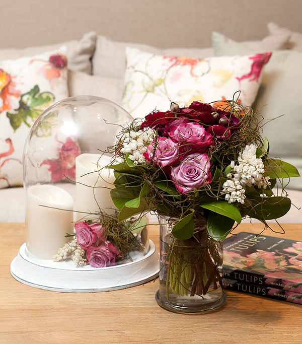 Spring flowers on coffee table.