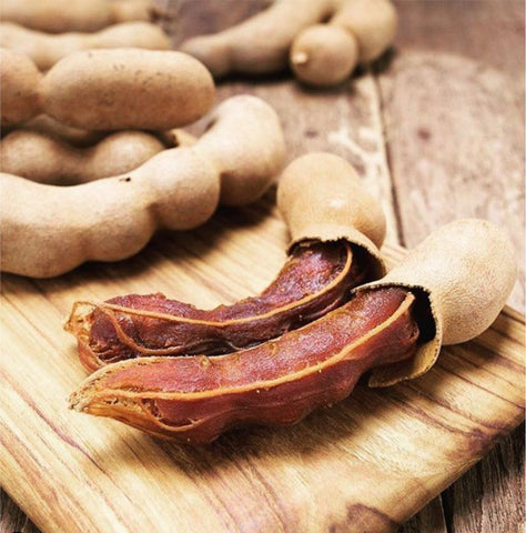 Tamarind or Imli used in EltheCook Readymade Tadka (Tempered SPice blends). Shipping worldwide
