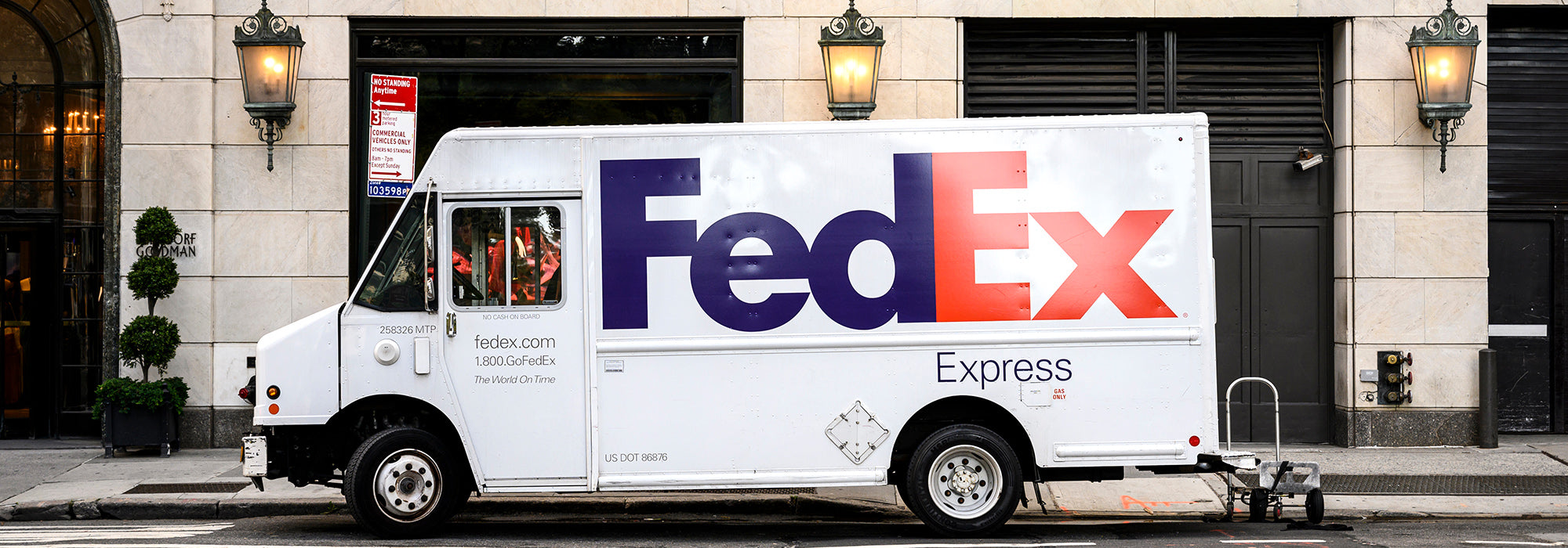 fedex truck delivering