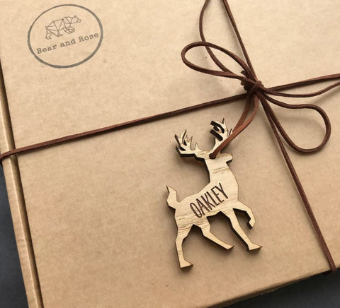 Gift in brown box with Bear and Rose stamp and personalised reindeer gift tag