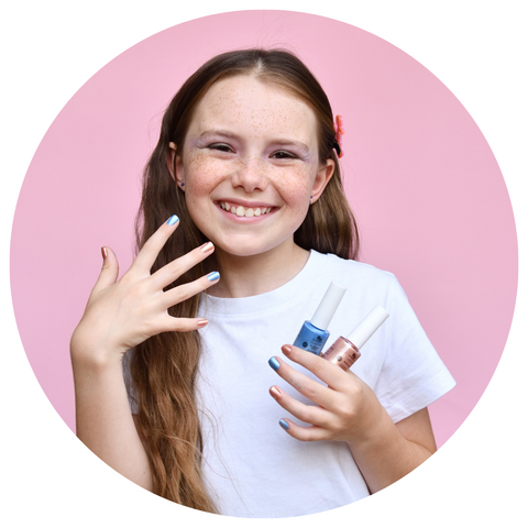 little-girl-showing-nail-polish