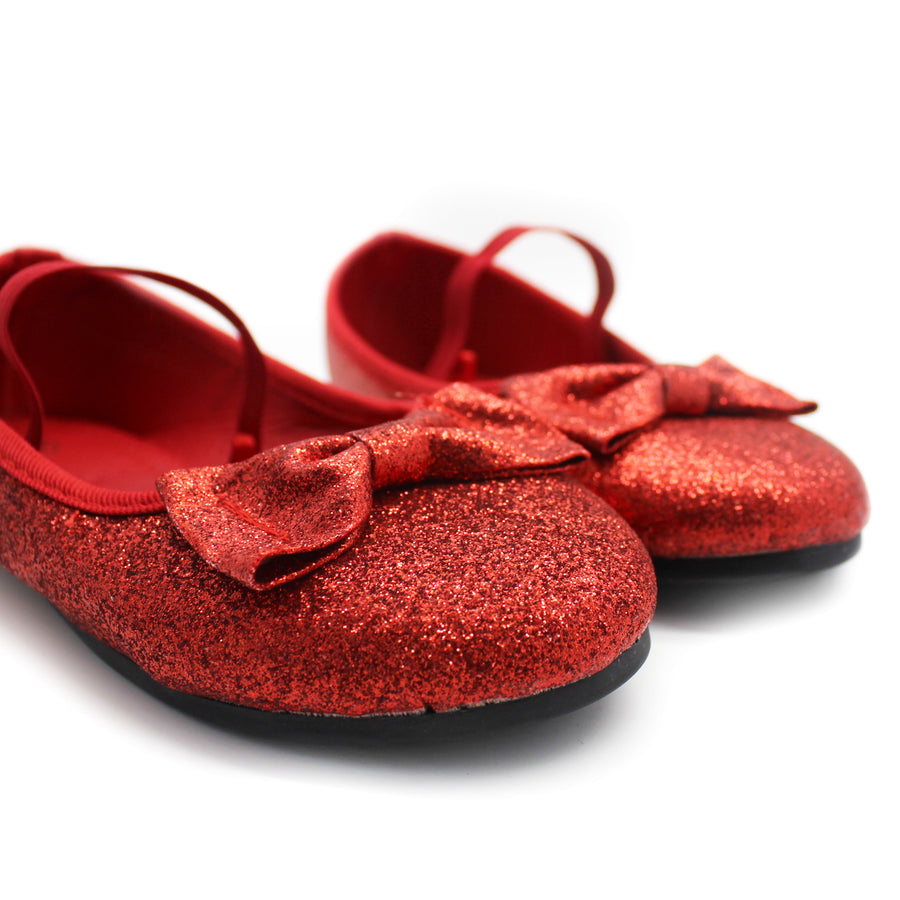 red sparkle shoes child