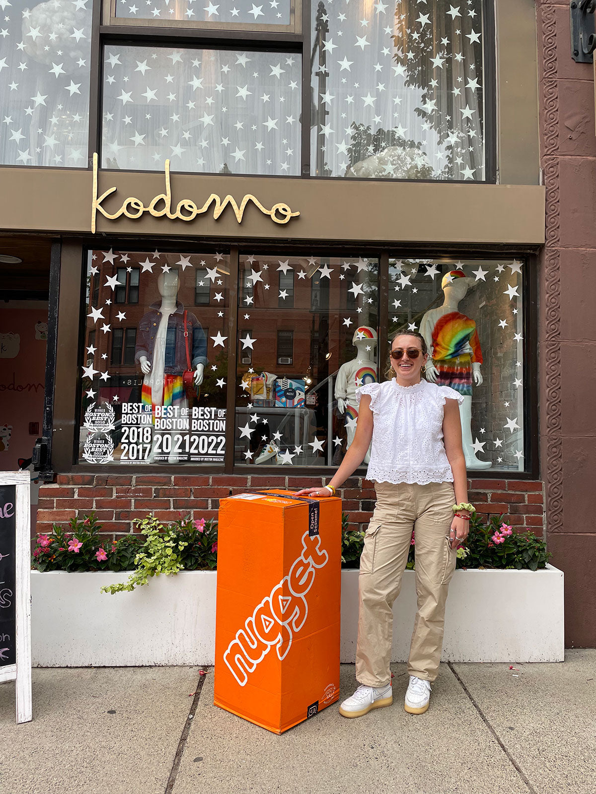 Owner of Kodomo outside her storefront
