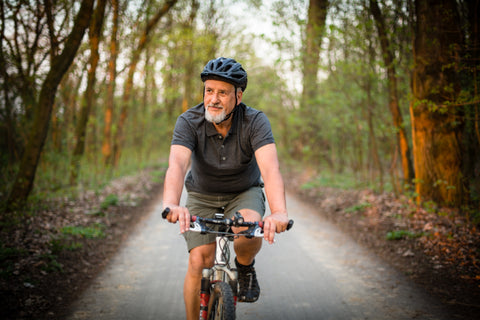 Senior man on his mountain bike outdoors