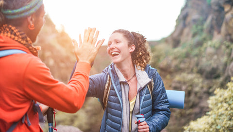 Active Happy Woman and Friend Hiking to Boost Free Testosterone Level