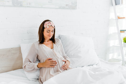 Optimal Fertility - Healthy Pregnant Woman Waking Up in the Morning