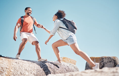 Happy Couple with Optimal Salivary Hormone Levels Hiking on a Summer Day - Mitochondrial Function