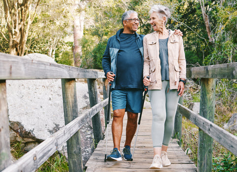 Healthy Active Elderly Couple with Optimal Free Testosterone Levels Hiking Outside