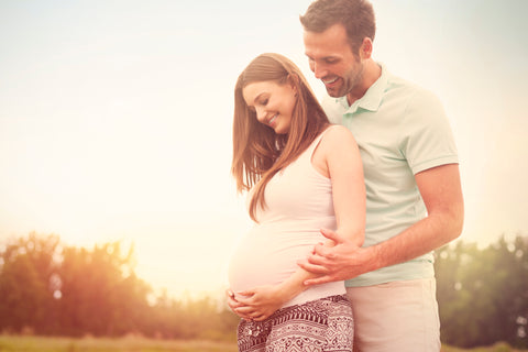 Happy Married Couple with a Baby on the Way - Healthy Male Fertility Supplements