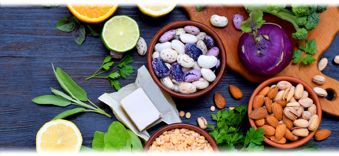 An image featuring foods rich in folic acid such as leafy greens, beans, and citrus fruits. The image suggests the topic of folic acid and its importance for health