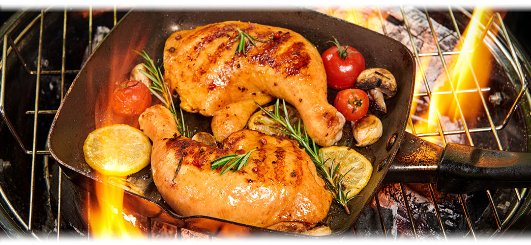 Grilled chicken breast served with vegetables, representing a healthy meal option rich in protein.