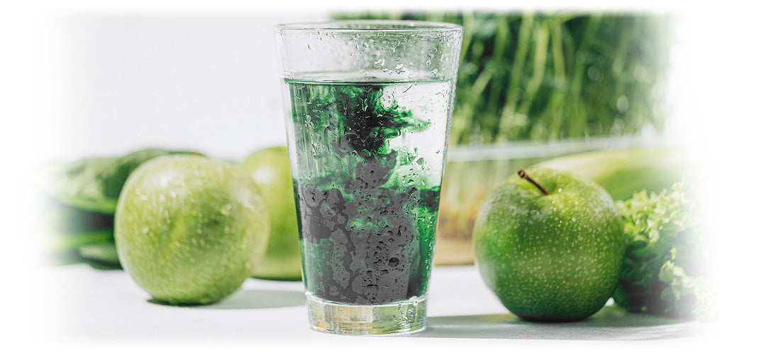 Liquid Chlorophyll in glass with mint leaves