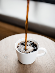 freshly ground cup of coffee, freshly ground coffee beans