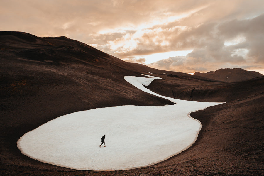 Man walking on ice. Snow Mark Clinton