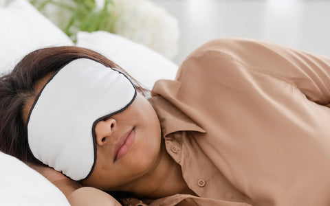 woman sleeping with eye mask