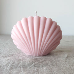 hebe shell candle unscented in pink light rose colour