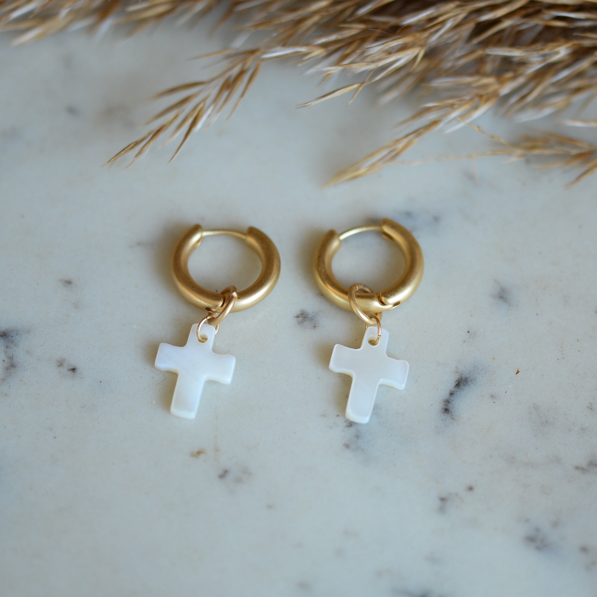 Big Metal London Cross Huggies in Gold