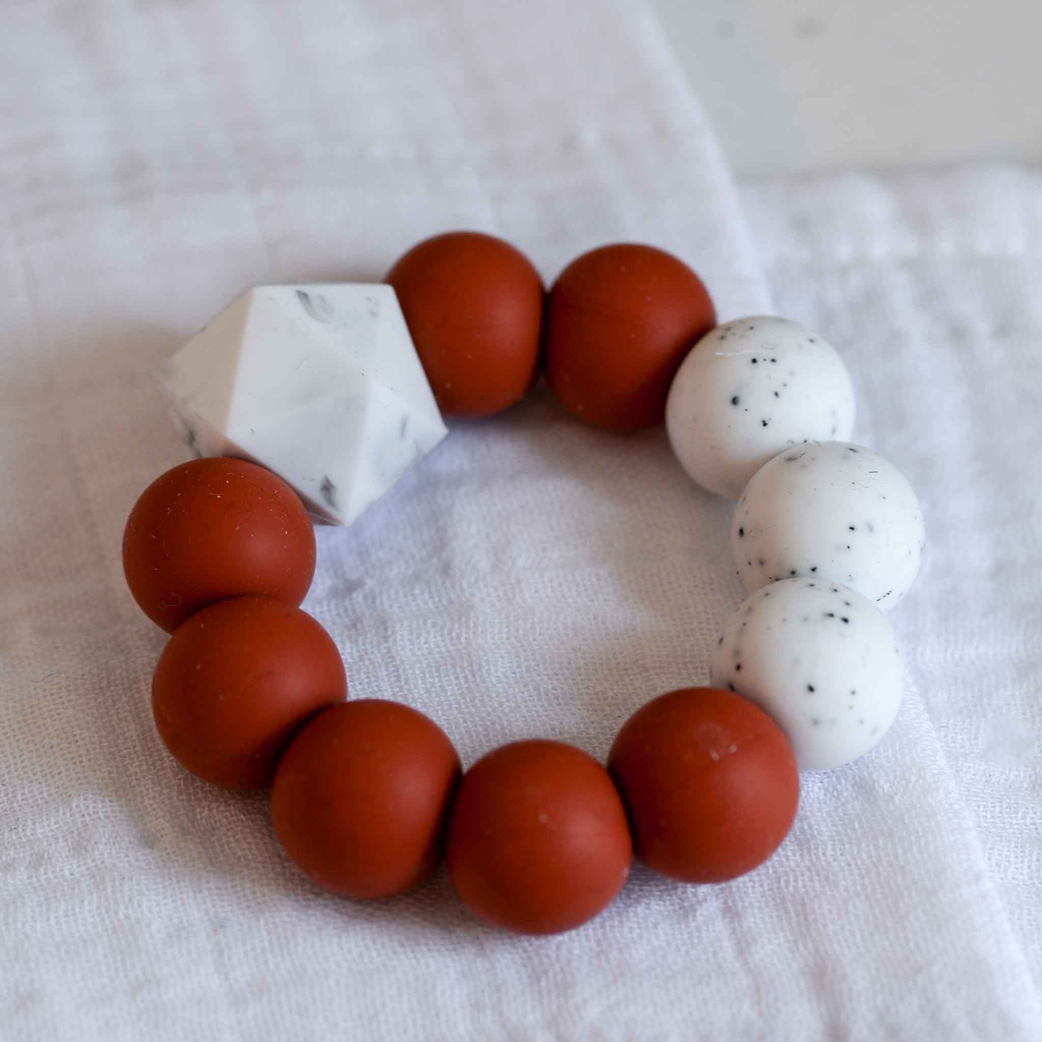 Baby Teething Ring in Rust Red