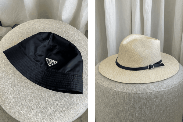 Prada nylon bucket hat and Perez Panama hat on neutral linen backround