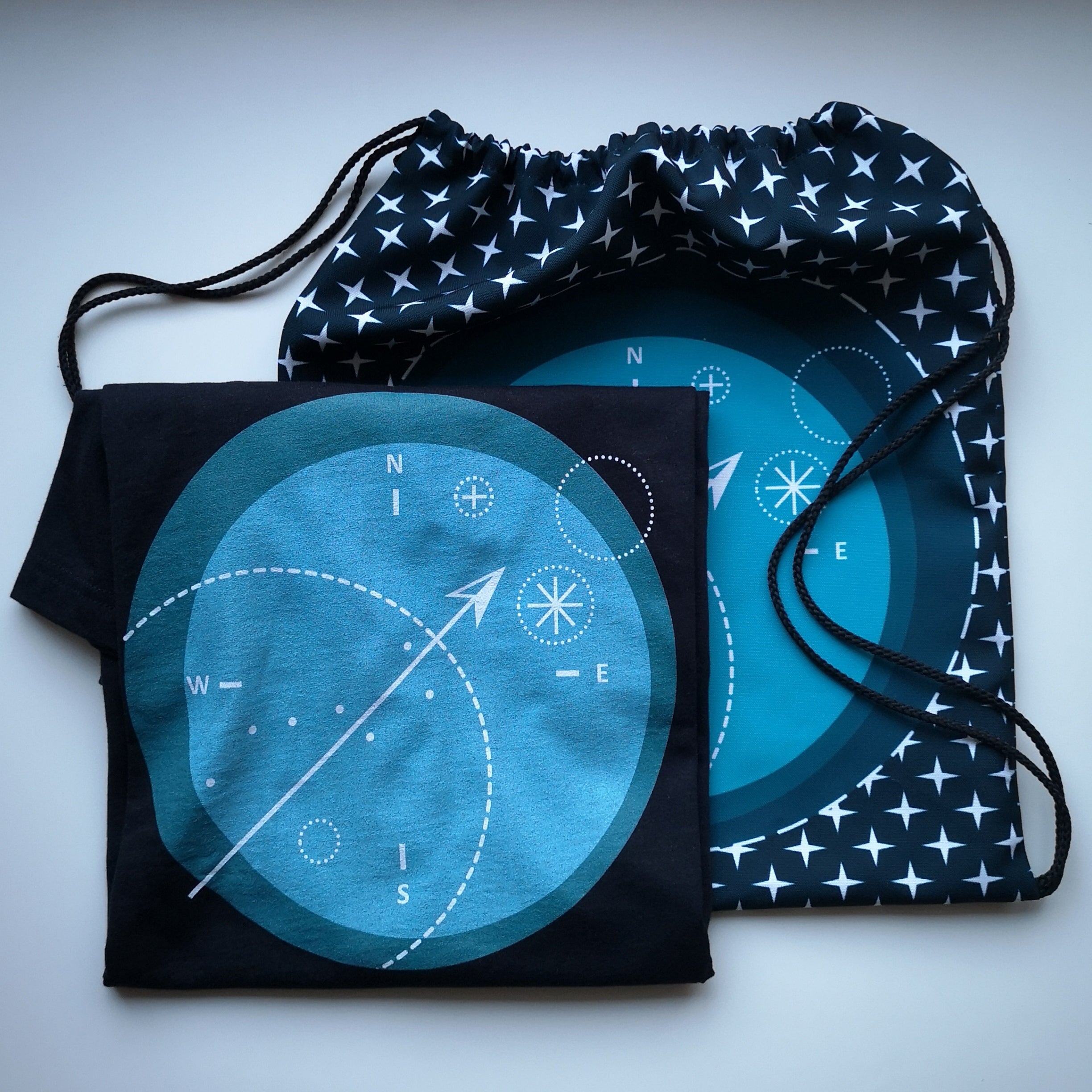 compass t shirt and drawstring bag tamed winds t shirt shop and blog