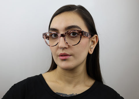 Woman wearing these luxury designer SEE Eyeglasses