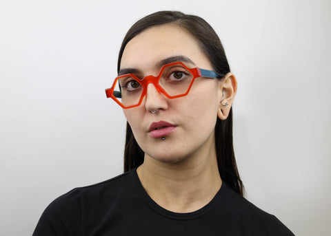 Woman wearing these SEE Eyeglasses