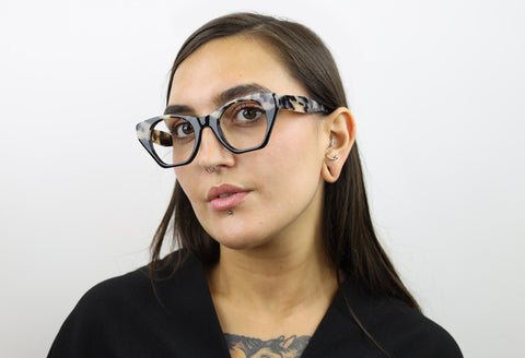 Woman wearing these luxury designer SEE Eyeglasses