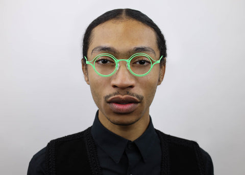 Man wearing these SEE Eyeglasses