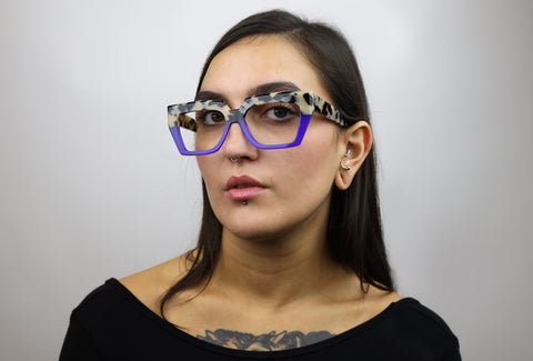 Woman wearing these luxury designer SEE Eyeglasses