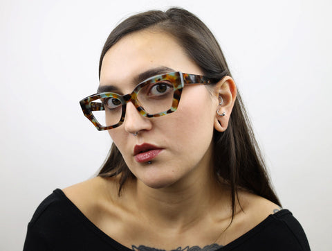 Woman wearing these SEE Eyeglasses