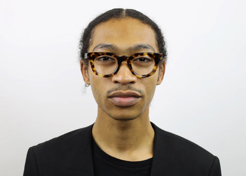 man wearing these luxury designer SEE Eyeglasses