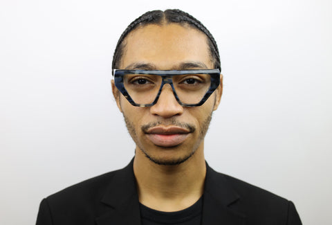 Man wearing these luxury designer SEE Eyeglasses