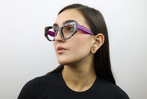 Woman wearing these luxury designer SEE Eyeglasses