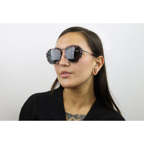 Woman wearing these luxury designer SEE sunglasses