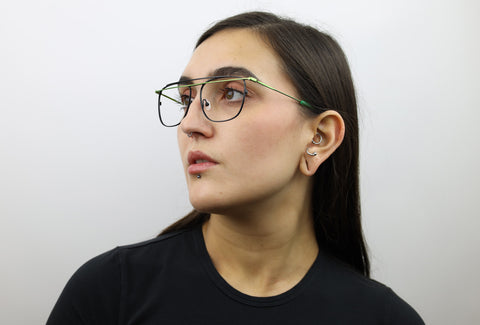 Woman wearing these luxury designer SEE Eyeglasses