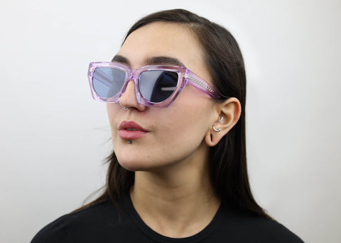 Woman wearing these SEE Eyeglasses