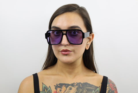 Woman wearing these luxury designer SEE Eyeglasses