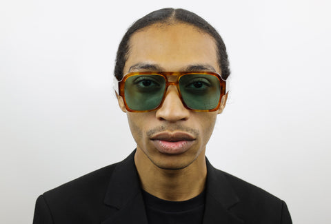 Man wearing these luxury designer SEE Eyeglasses