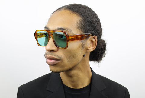 Man wearing these luxury designer SEE Eyeglasses