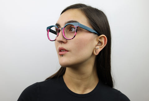 Woman wearing these luxury designer SEE Eyeglasses