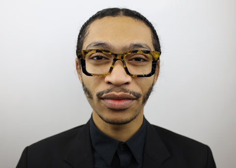 man wearing these luxury designer SEE Eyeglasses