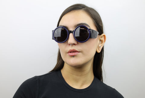 Woman wearing these luxury designer SEE sunglasses