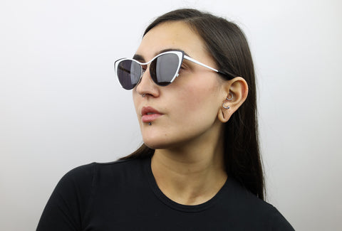 Woman wearing these luxury designer SEE cat eye sunglasses