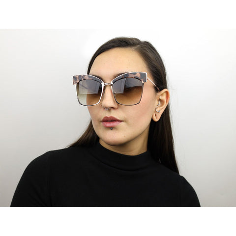 Woman wearing these luxury designer SEE cat-eye Sunglasses