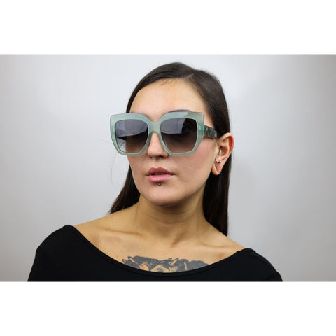 Woman wearing these luxury designer SEE sunglasses