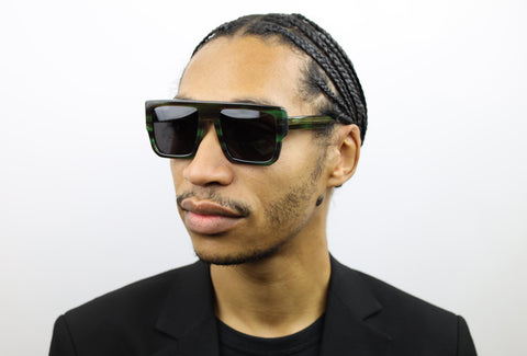 Man wearing black glasses. Luxury designer SEE sunglasses