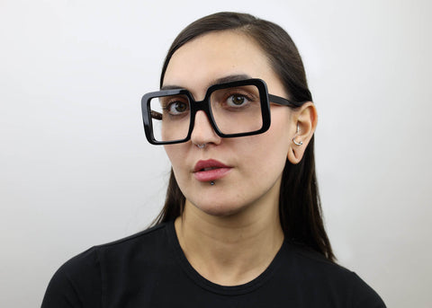 Woman wearing these SEE Eyeglasses