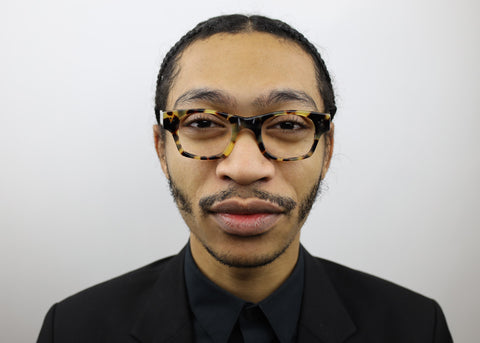 man wearing these luxury designer SEE Eyeglasses