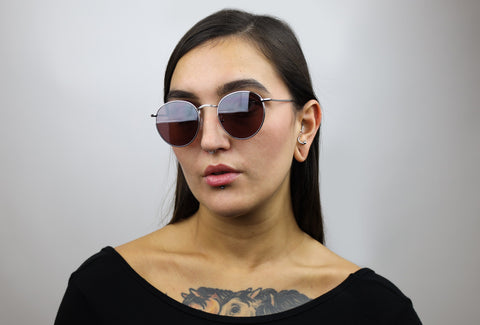 Woman wearing these luxury designer SEE sunglasses